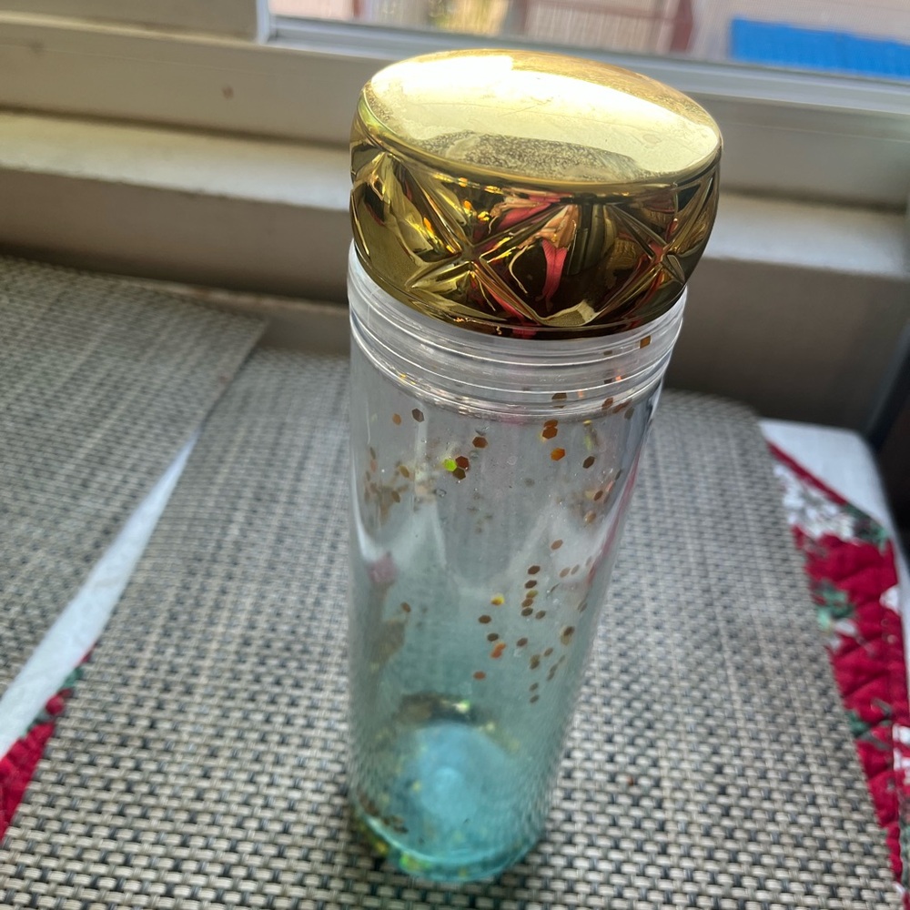 Possibly from Charming Charlie Gold and Clear Glitter Water Bottle